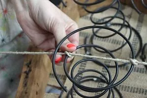 Spring stringing