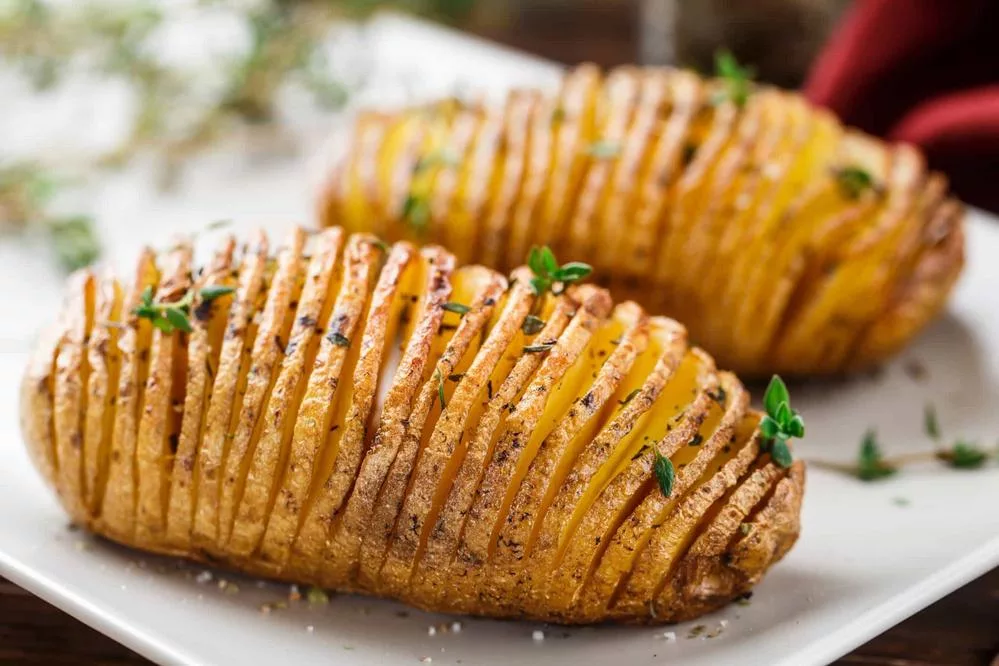 BBQ lamb and Hasselback potatoes