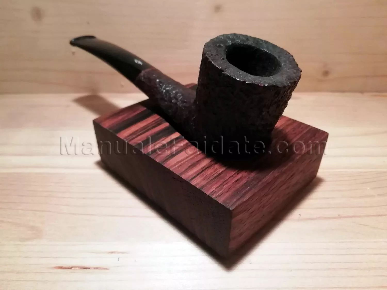 Pipe holder in solid zebrano wood